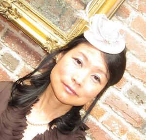 Rumiko was happy with her headpiece mad for her matching with her bag and shoes.